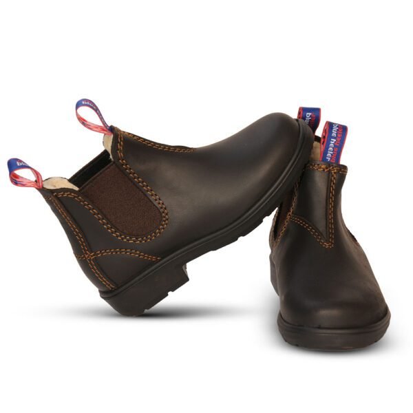 Kids’ brown leather Chelsea boots with tan stitching and fleece lining, shown in a stacked front-side angle pair view.