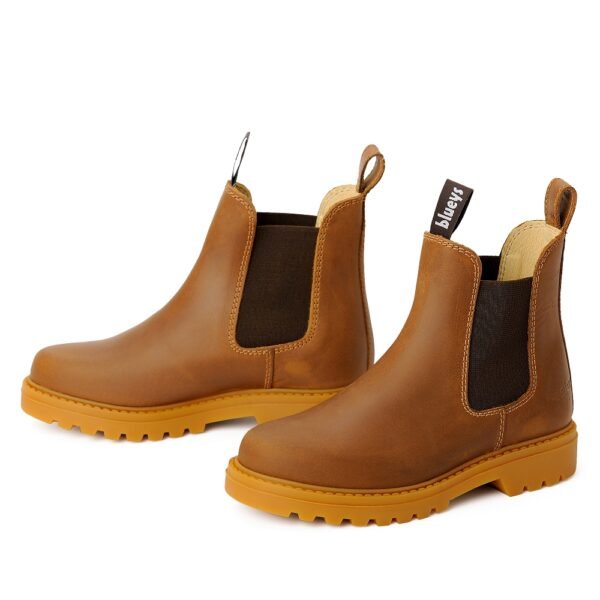 Pair of tan leather Chelsea boots with brown elastic gussets and rugged soles, shown in angled front and side view.
